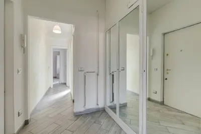a hallway with two mirrors in a room at Rome Apartment with terrace Autonomous in Rome
