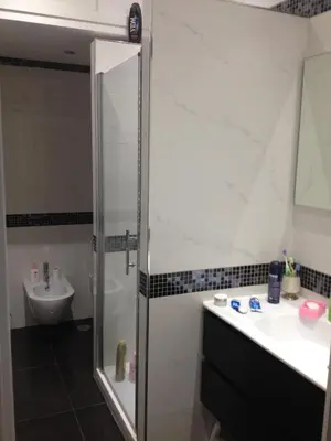a bathroom with a shower and a sink at Guest House Hello Roma in Rome