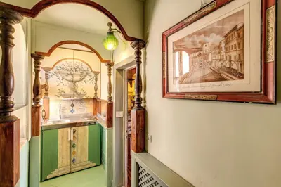 a living room with a couch and a table at Campo De Fiori Baroque in Rome