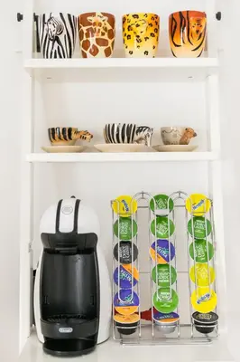 a coffee maker on a shelf in a refrigerator at Xystum in Rome