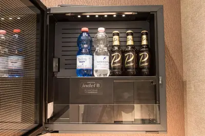 a cooler full of bottles of bottled water at Roma 2B in Rome