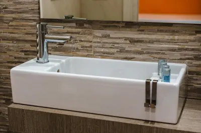 a white sink with a faucet in a bathroom at Guest House Grazioli in Rome