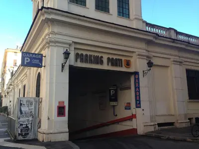 a building with a parking ramp in front of it at Fotofever Apt, two bedrooms with air conditioned in elegant shopping area, close to Vatican City in Rome