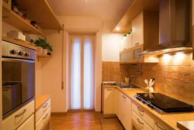 a kitchen with a sink and a counter top at La Casa di Emma a Trastevere in Rome