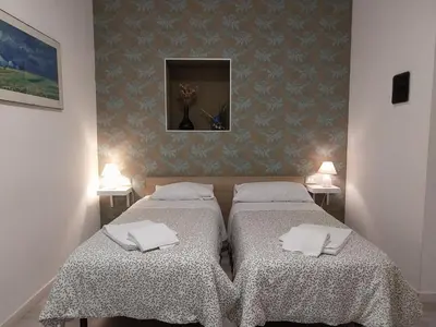 a room with a table and a table with plants at Appia 52 in Rome