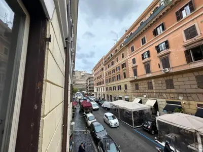 a view from a window of a street with cars parked at Candia41 in Rome