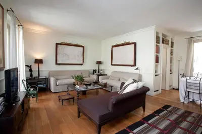 a living room with a couch and a tv at Terrace Jewel by Campo de Fiori in Rome