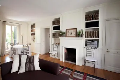 a living room with a couch and a fireplace at Terrace Jewel by Campo de Fiori in Rome