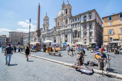 a group of people playing instruments in a city street at Relax Apartment Zanardelli, Piazza Navona in Rome