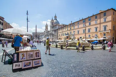 a group of people standing in a street at Tetti di Piazza Navona in Rome