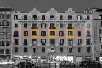 a large building with many windows in a city at Viminale View Hotel in Rome
