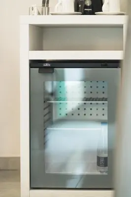 an oven with its door open in a kitchen at Vaticano Luxury Guest House in Rome