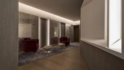 a hallway with chairs and a waiting room at Fendi Private Suites - Small Luxury Hotels of the World in Rome