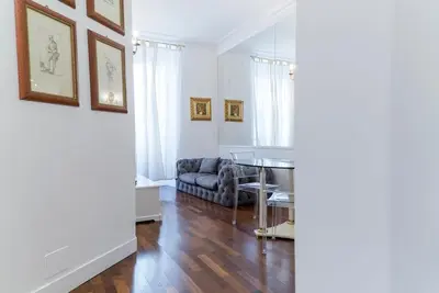 a living room with a couch and a table at Prinsi Apartments in Rome