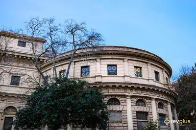 a large stone building with a tree in front of it at Magic Double in Rome