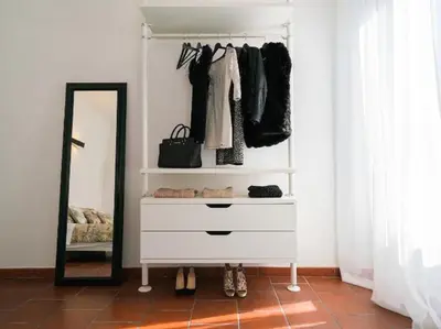 a dressing room with a dresser and a mirror at Garibaldi Roof Garden in Rome