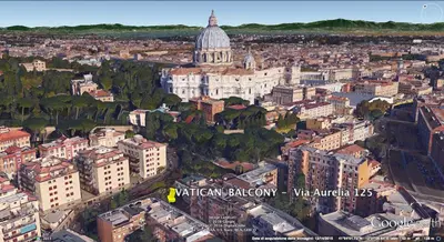 an aerial view of a city with a cathedral at Vatican Balcony in Rome