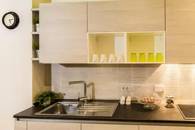 a kitchen with a sink and a counter top at The Green Corner in Rome