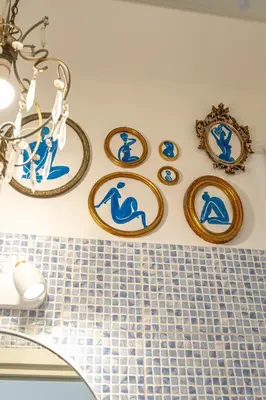 a counter with blue and white porcelainctors on a wall at Al Ponte Del Papa B&B in Rome
