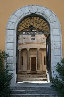 a large stone building with a door and stairs at Appartamento Castel Sant'Angelo in Rome