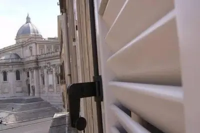 an open door with a view of a building at Sarah's House - Tourist Accommodation in Rome