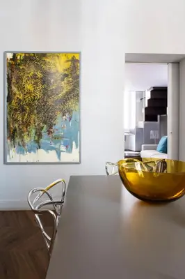 a dining room with a large yellow bowl on a table at Le Quattro Dame Luxury Suites in Rome