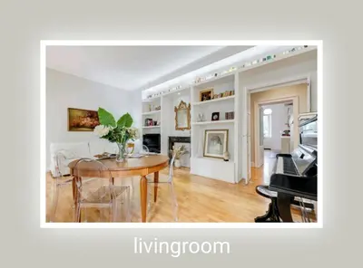 a living room with a table and a piano at Eluta Holiday Home in Rome