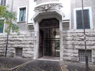 an entrance to a building with a door at Holiday House Roma Vaticano in Rome