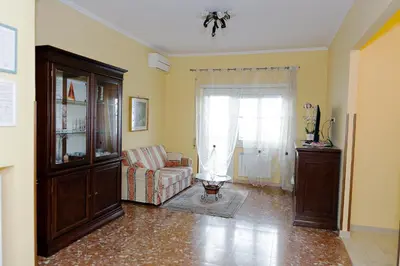 a living room with a couch and a window at Casa Vacanza Da Andrea in Rome