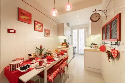 a kitchen with a table with food on it at B&B La Maison de Jo in Rome