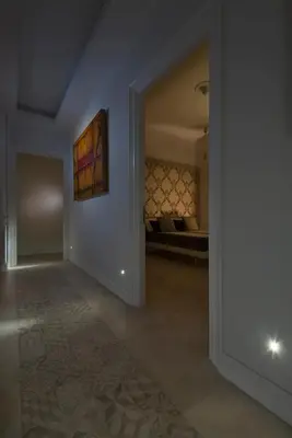 an empty hallway with a room with a bed at Vaticanspace Rooms in Rome