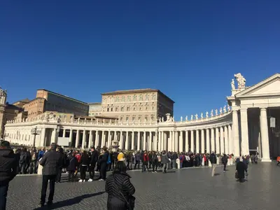 a crowd of people standing in front of a building at Pianeta Roma 127 in Rome