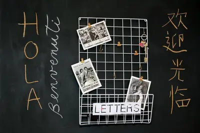 a chalk board with pictures and writing on it at Laterano 238 Apartment in Rome