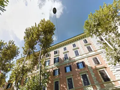 a building with a ball on top of it at iRooms Central Station in Rome