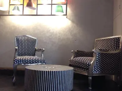 two chairs and a table in a room at iRooms Central Station in Rome