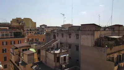 an aerial view of a city with buildings at Bea&B in Rome