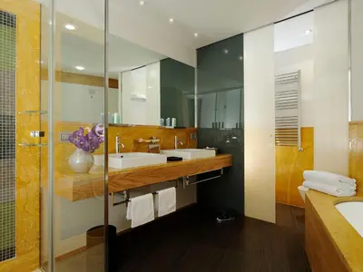 a bathroom with a sink and a mirror at Babuino 181 - Small Luxury Hotels of the World in Rome