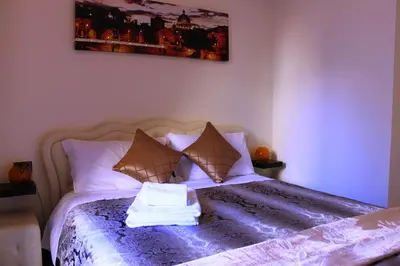 a bedroom with a bed with two towels on it at Vietitaly Filiberto in Rome