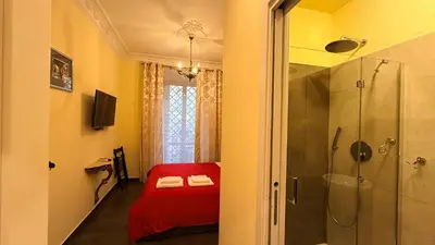 a bedroom with a bed and a window at Vietitaly Filiberto in Rome