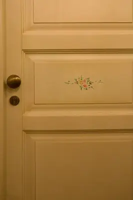 a door with a flower sticker on it at Sweet Dream Trevi in Rome