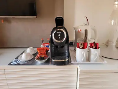 a coffee maker sitting on top of a counter at Shali Luxury Suite Spagna in Rome