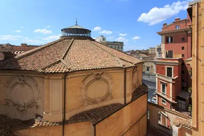 a view of a building with a tile roof at Mascagni Luxury Rooms & Suites in Rome