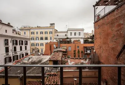 a view of a city from a balcony at Domus Colosseum in Rome