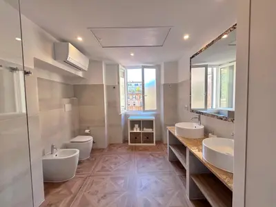 a dishwasher with its door open in a kitchen at Vicolo Doria Apartment in Rome
