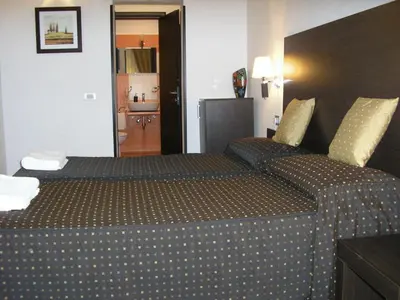 a hotel room with a bed in a room at Roman Residence in Rome