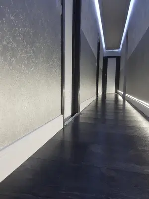 an empty hallway with lights on the side of a building at Glamour Spanish Steps in Rome