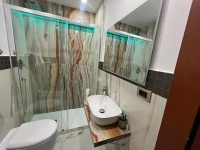 a bathroom with a sink and a shower at Hotel Ercoli House in Rome