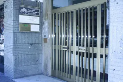 a metal gate on the side of a building at Vatican Luxury Home in Rome
