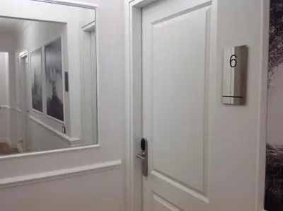 a door with a mirror in a room at Vatican Luxury Home in Rome