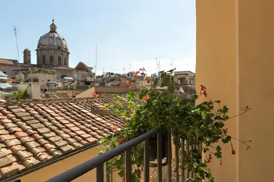 a balcony with a view of a city at Rome as you feel - Grotta Pinta apartments in Rome